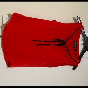 Pretty reddish orange blouse